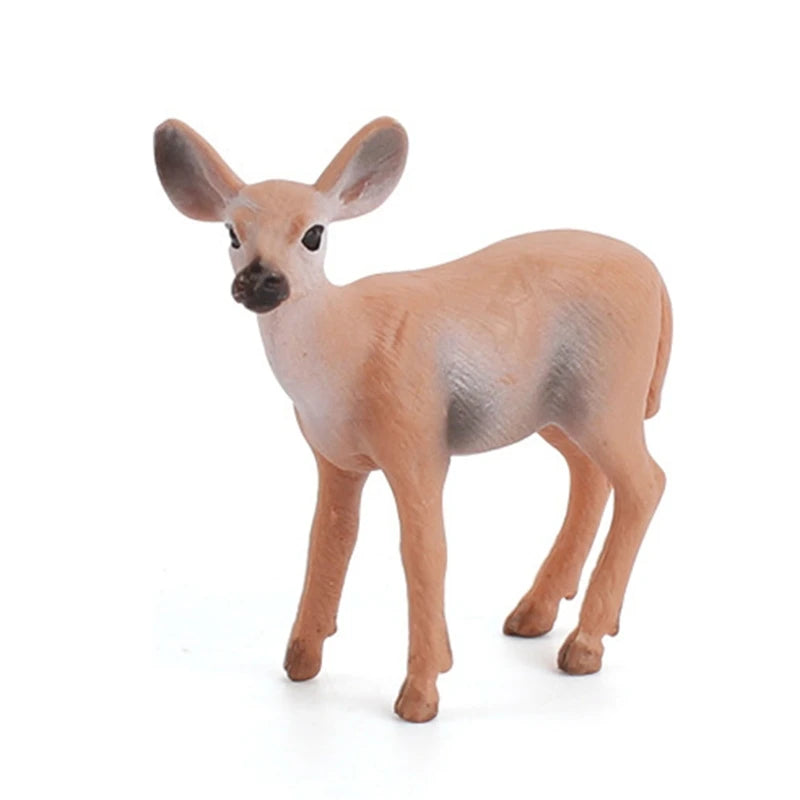 A small deer figurine shown standing on a plain white background. The animal has a light tan and pinkish-beige body with darker brown legs, black eyes, and a dark muzzle.