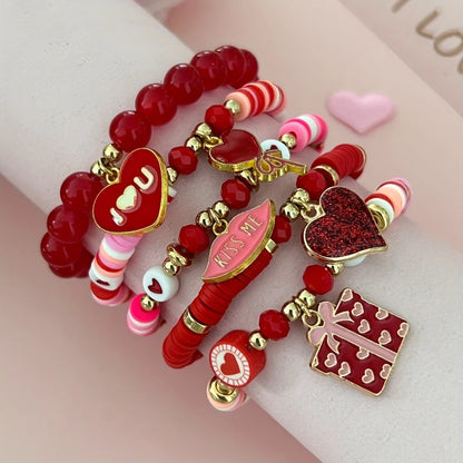 Colorful beaded bracelet with heart-shaped charms on a pink background. Valentines Day Party Bracelet