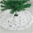 White faux fur tree skirt for a small Christmas Tree