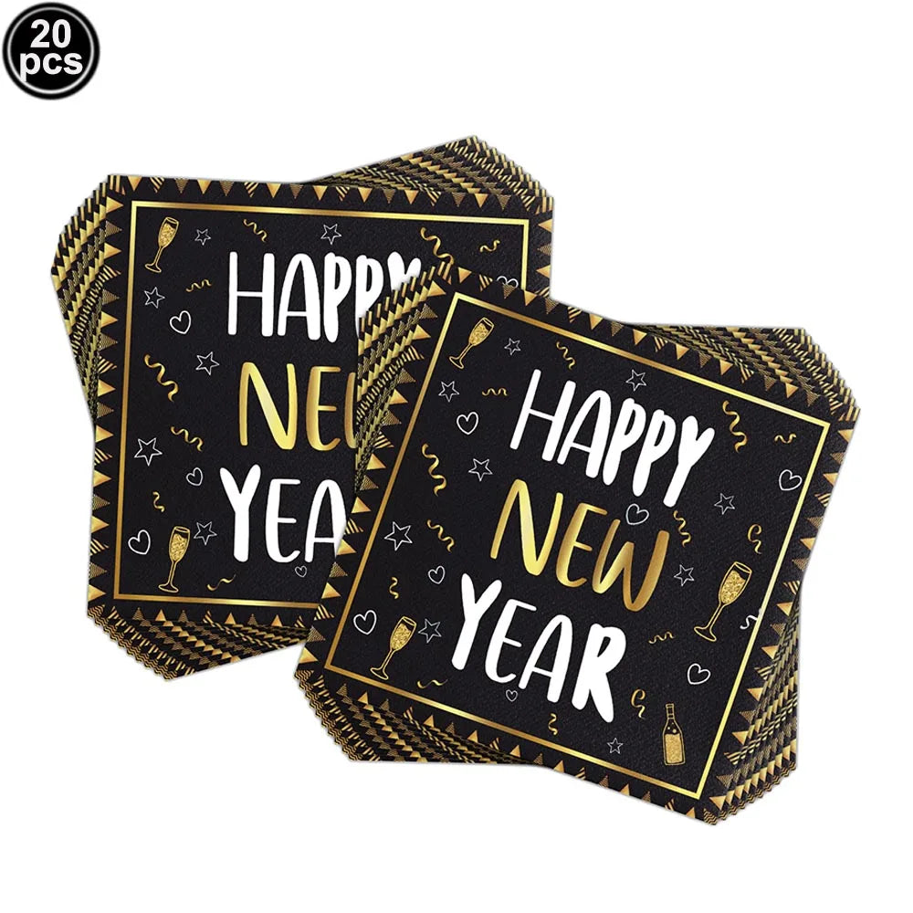 Stack of 'Happy New Year' napkins with black and gold design on a white background