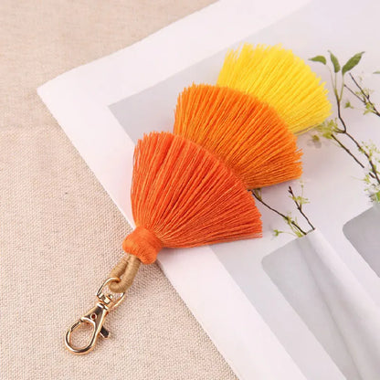 orange yellow 3 layer tassel bag charm