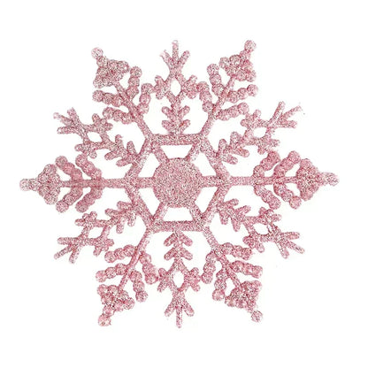 Pink glittery snowflake on a white background